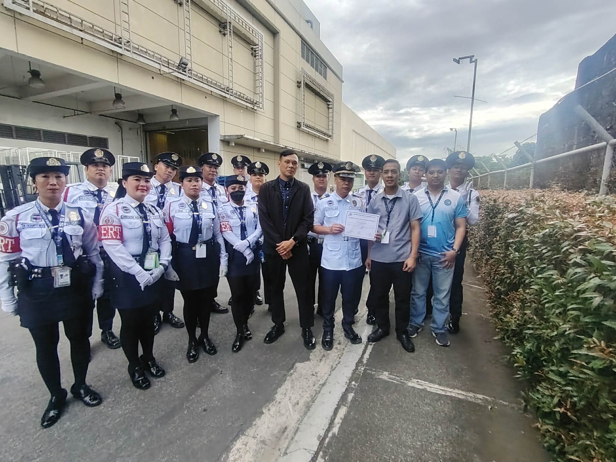 Client recognition ceremony with security personnel